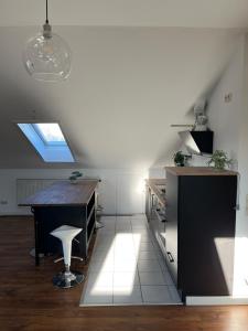 Kuchyň nebo kuchyňský kout v ubytování Moderne & stilvolle Wohnung klimatisiert - Messe & Flughafen München