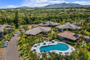 an aerial view of a resort with a swimming pool at Mauna Kai 5A in Princeville