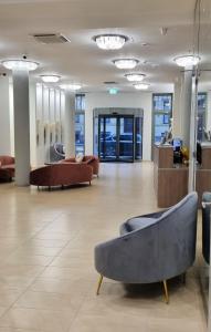 Posezení v ubytování Hotel Három Gúnár
