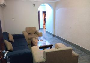 Area soggiorno di فندق أصالة الحمراء