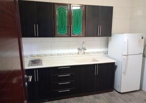 Cucina o angolo cottura di فندق أصالة الحمراء