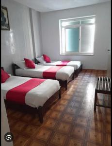 Katil atau katil-katil dalam bilik di Hotel Astoria Tanger
