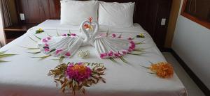 Postel nebo postele na pokoji v ubytování Nadine Phu Quoc Resort & Spa