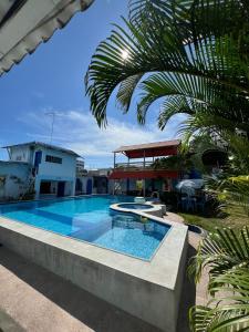 Bazén v ubytování Hostal Aruba nebo v jeho okolí