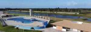 an aerial view of a swimming pool in a resort at Paradise in Estância