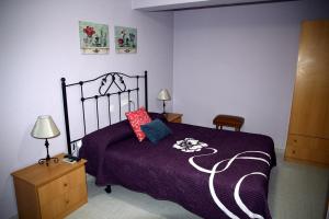 Кровать или кровати в номере Hostal Asturias