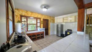 Kuchyň nebo kuchyňský kout v ubytování Guamacayan House