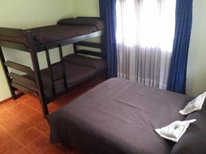 Postel nebo postele na pokoji v ubytování Cabaña San José