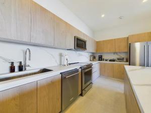 Bilde i galleriet til Solaris Suray 4 Bedroom Condo at Reserva Conchal i Brasilito