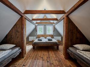 a bedroom with two beds in a attic at Chalet in Horni Marsov near Ski Slopes in Horní Maršov