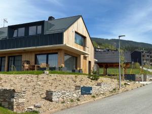 a house on the side of a road at Apartment in Cerny Dul near Ski Resort in Cerny Dul