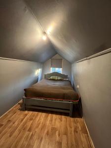Postel nebo postele na pokoji v ubytování Tiny house