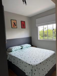 Postel nebo postele na pokoji v ubytování Apto com linda vista