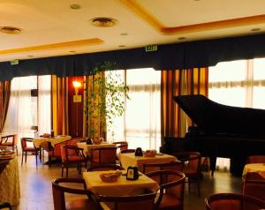 Posezení v ubytování Hotel Grazia Deledda