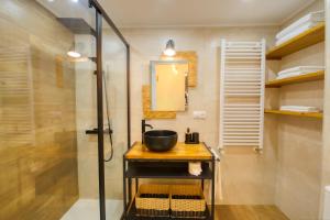 a bathroom with a sink and a shower at Apartamentos en Gascona Centro de Oviedo Apartastur26 in Oviedo +34 photos