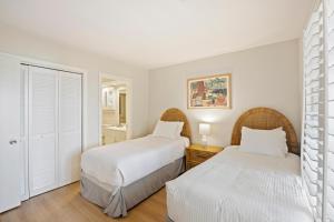 Ένα ή περισσότερα κρεβάτια σε δωμάτιο στο 50 Inlet Cove