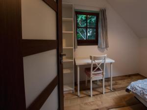 Postel nebo postele na pokoji v ubytování Villa in Ore Mountains near Ski Areal Kliny