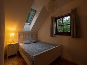Postel nebo postele na pokoji v ubytování Villa in Ore Mountains near Ski Areal Kliny