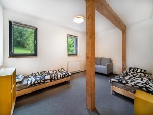 Rúm í herbergi á Villa in Desná near Ski Resorts
