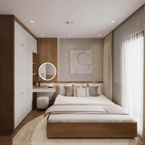 FLC Sea Tower Quy Nhơn-Khách Sạn Mặt Biển-Hồ Bơi Vô Cực-Thanh Apartment في كوي نون: غرفة نوم بها سرير كبير ومكتب