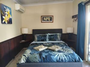 Voodi või voodid majutusasutuse Daintree Riverview Lodges toas