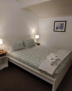 Ένα ή περισσότερα κρεβάτια σε δωμάτιο στο Karas 6 Thredbo Village