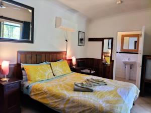 Voodi või voodid majutusasutuse Daintree Riverview Lodges toas