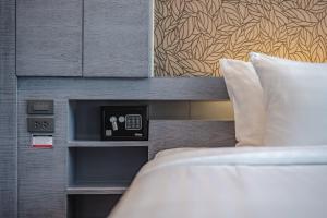 Ένα ή περισσότερα κρεβάτια σε δωμάτιο στο C161 1Km to beach New City gate +12 φωτογραφίες