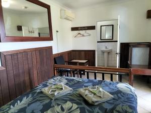 Voodi või voodid majutusasutuse Daintree Riverview Lodges toas
