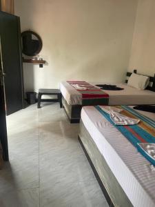 Ένα ή περισσότερα κρεβάτια σε δωμάτιο στο Yashi's Place Sigiriya