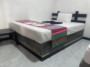 Ένα ή περισσότερα κρεβάτια σε δωμάτιο στο Yashi's Place Sigiriya
