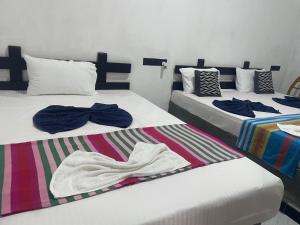 Ένα ή περισσότερα κρεβάτια σε δωμάτιο στο Yashi's Place Sigiriya