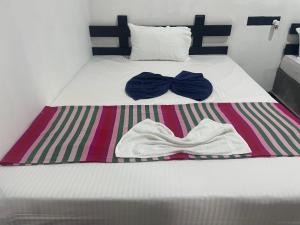 Ένα ή περισσότερα κρεβάτια σε δωμάτιο στο Yashi's Place Sigiriya
