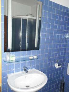 Koupelna v ubytování Hotel Arli