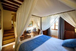 Cama o camas de una habitación en Son Grec Petit Resort - Adults Only