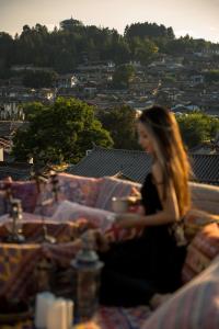 Tetamu yang menginap di Lijiang Hearing Flowers Hall Flowerless B&B