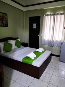 Postel nebo postele na pokoji v ubytování Bans Beach Resort