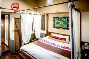 Postel nebo postele na pokoji v ubytování Hotel Balian Resort Kinshicho