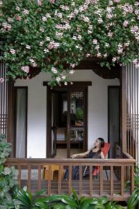 Balkón nebo terasa v ubytování Lijiang Hearing Flower Hall B&B Nanxuan Branch
