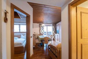 Postel nebo postele na pokoji v ubytování Residence Salvan