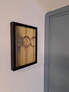a picture of an object hanging on a wall at Gesa´s & Tom´s Stadtappartement in Saalfelden am Steinernen Meer
