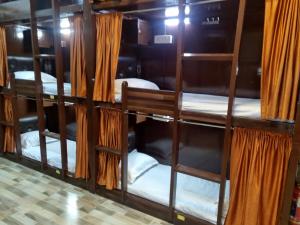 Postel nebo postele na pokoji v ubytování Unibed Dormitory
