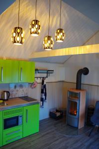 Kuchyň nebo kuchyňský kout v ubytování gemütliches Tiny House mit Sauna, Kamin und Fahrradgarage