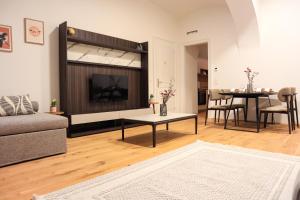 Posezení v ubytování Apartment Comfort - with Aircondition!