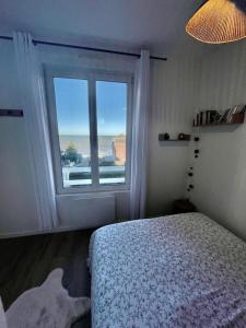 Postel nebo postele na pokoji v ubytování La Belle Etoile