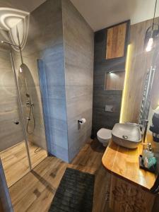 Et badeværelse på Apartamenty SKUPNIOWY UPŁAZ + 43 billeder