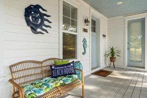 a bench on the front porch of a house at 1369 Laurel Grove "The Crows Nest" in Destin