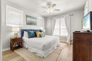 a bedroom with a bed and a ceiling fan at 1369 Laurel Grove "The Crows Nest" in Destin