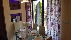 Posedenie v ubytovaní BUTOROWY RESIDENCE Apartament "GÓRSKA ORCHIDEA"