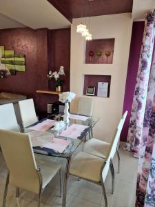 Posedenie v ubytovaní BUTOROWY RESIDENCE Apartament "GÓRSKA ORCHIDEA"
